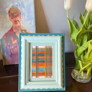 Hand-painted frame and textile art in turquoise and orange