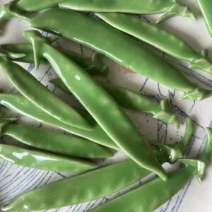 Porcelain pea pod brooch