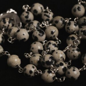 close up of dalmataion jasper beads